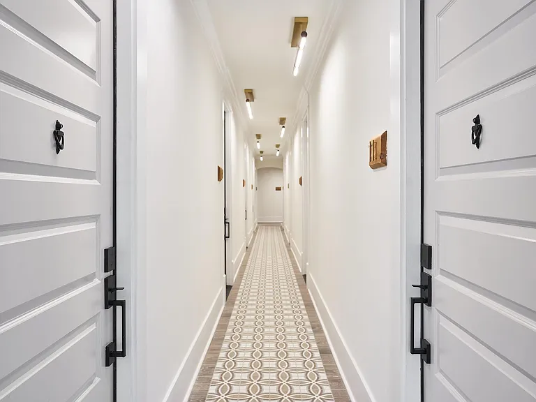 The main hallway flows thru the sanctuary from the front door, lobby and elevator lift.