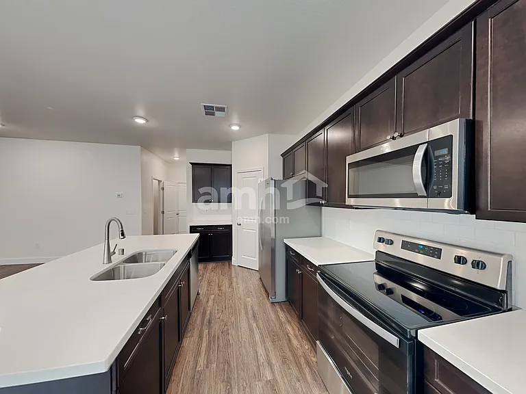 6035 Theodore St — Photo 4