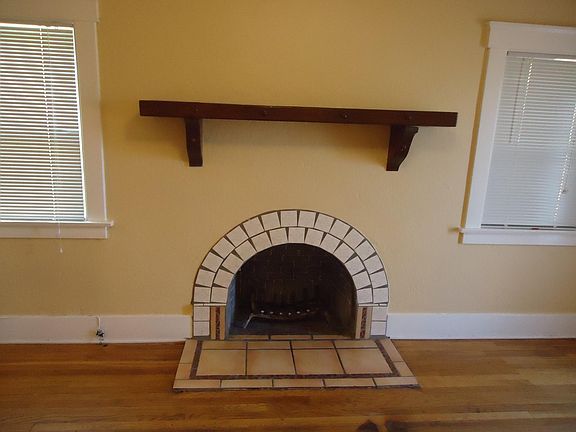 Fireplace & mantel.