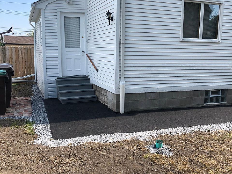 ENTRANCE TO APARTMENT AT BACK OF HOUSE