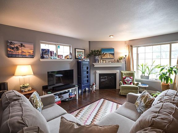 Hardwood floors on the main level. Tile in the powder room on main level.
