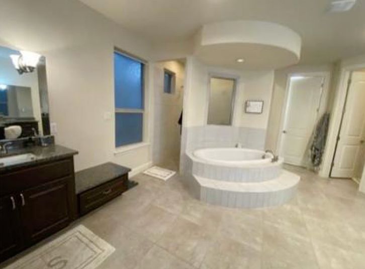 Master bathroom grand tub, luxury walk in shower, double vanity sinks