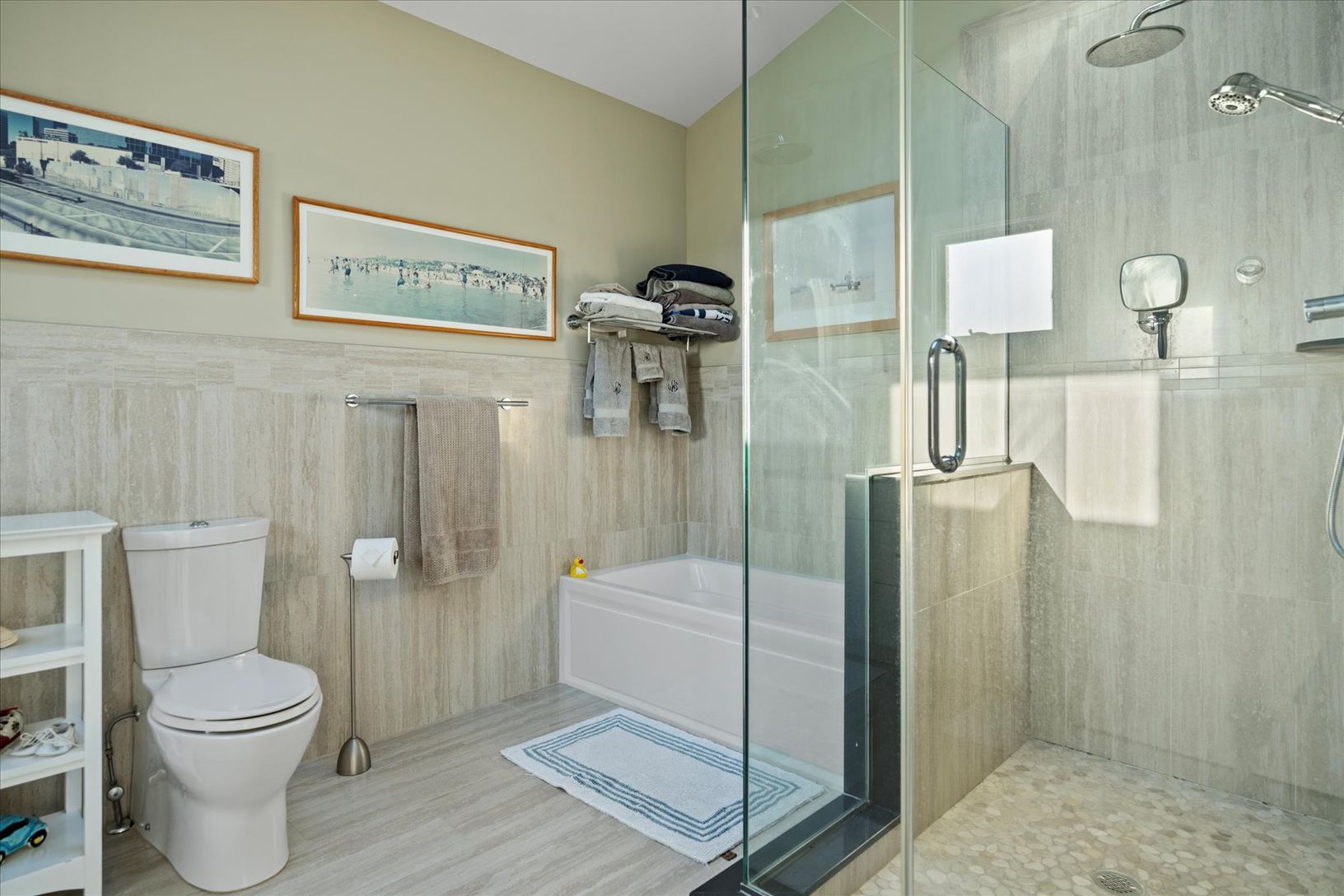  Tub, shower and sundrenched primary en suite bathroom