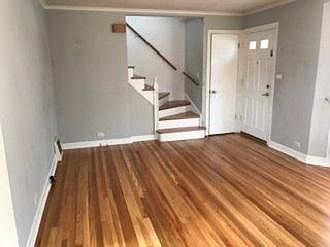 Living room and stairway going up to bedrooms