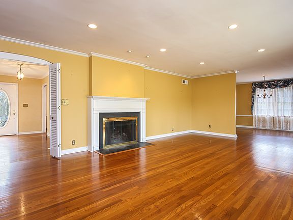 Living Room with Wood Burning Fireplace
