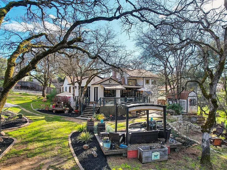 A view of the backyard, which you will have access to, and the adjacent main house.