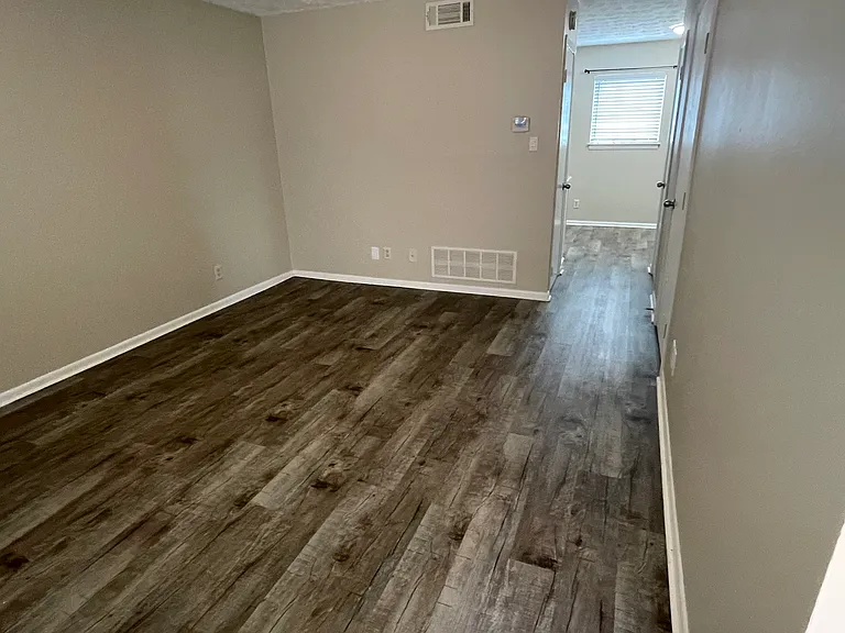 Living room looking toward the back door and deck area