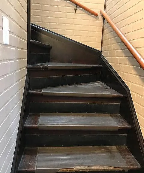 Stairs leading to basement.