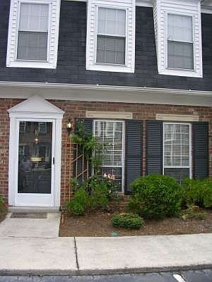 This 4-sided traditional brick townhome is a wonderful investment.