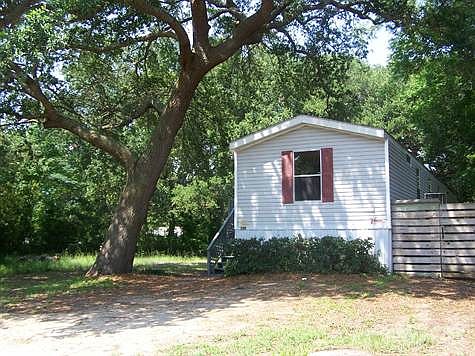 Large Oak Trees on lot next door prevent building on it.