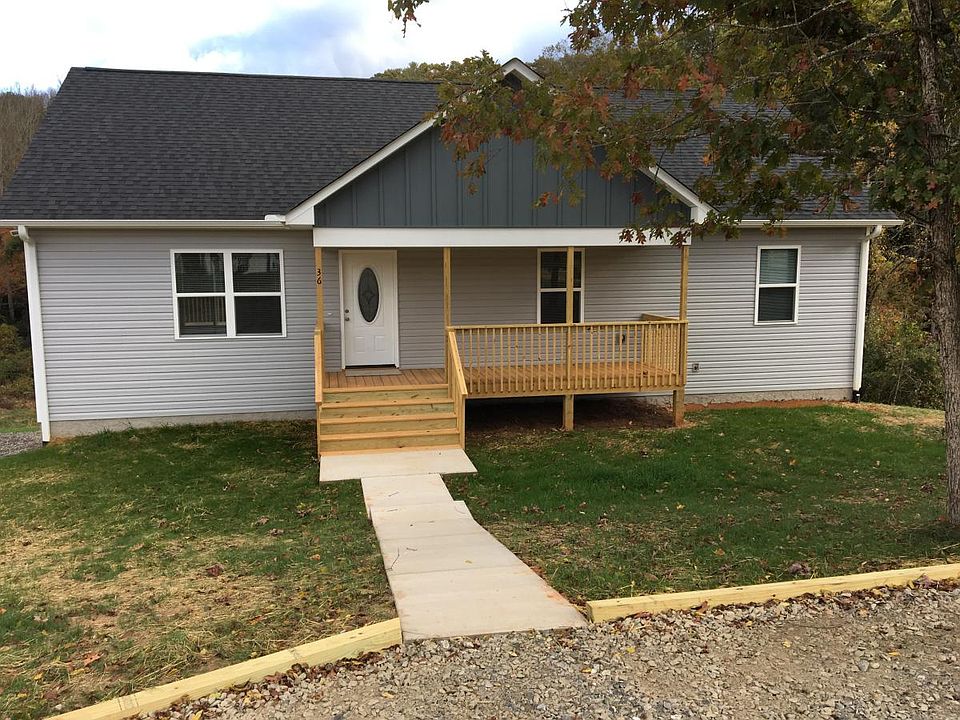 New creekside construction on 1.8 acres