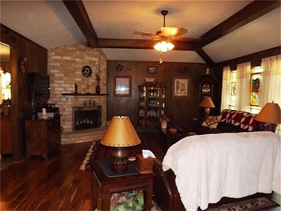 Wood beams on ceiling are a rustic feature of home
