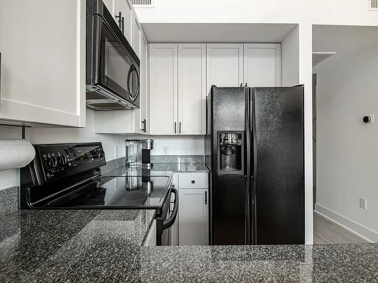The fridge and dishwasher have recently been upgraded to stainless steel