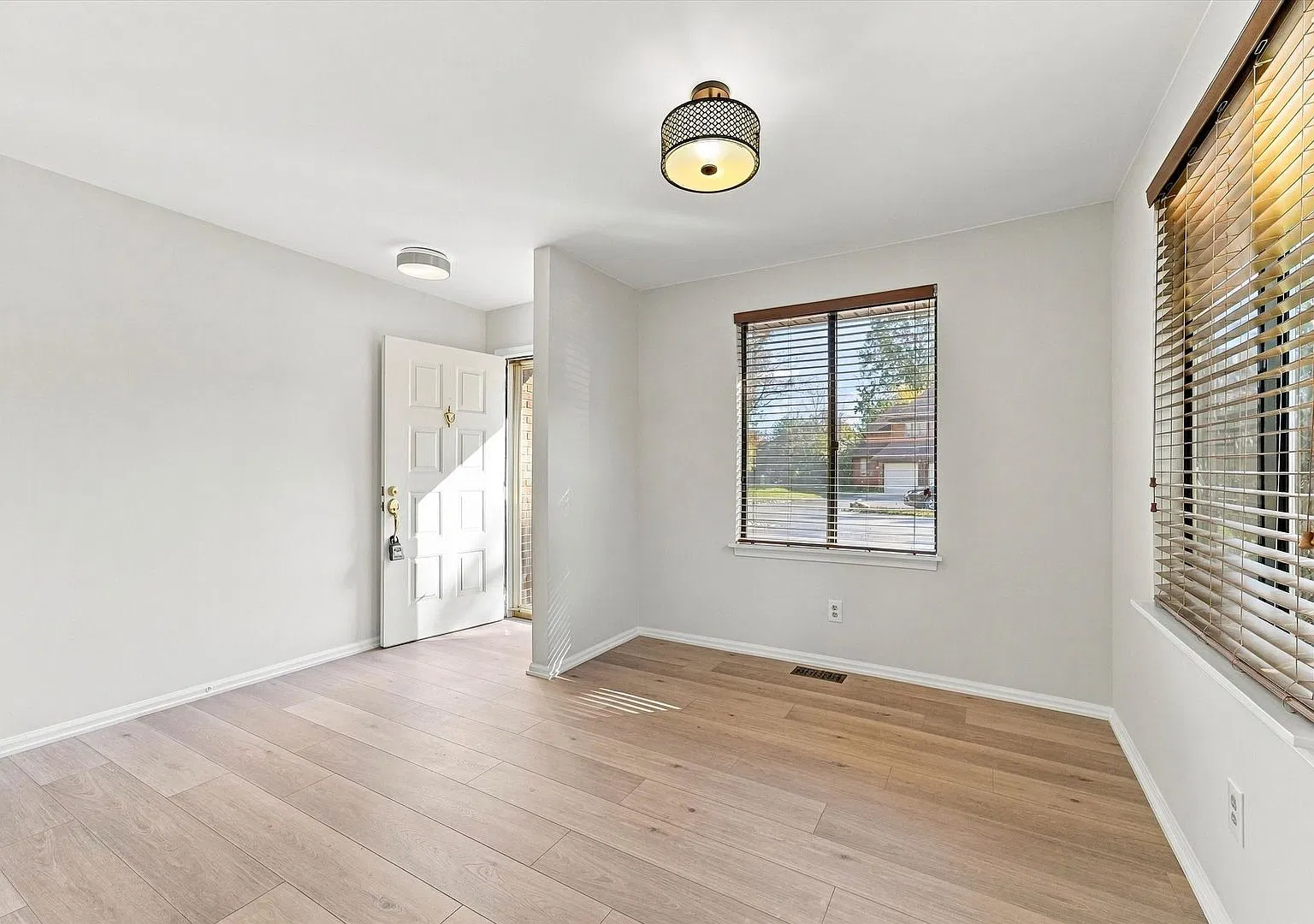 Beautifully Renovated End-Unit Townhome with Finished Basement, Deck & Garage | 300 Winding Way — Photo 2