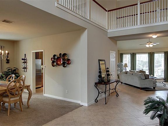 Open, Light and Bright Floor Plan and Dramatic Catwalk over the Living Room.