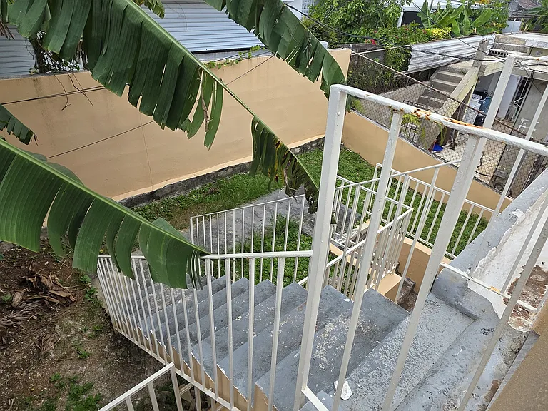 Private entrance staircase.