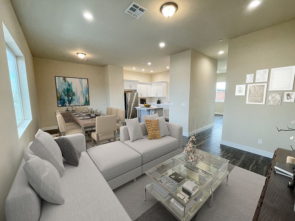 Another view of main Living Room/Dining Room/Kitchen. Through the hall is the Family Room/Flex Space and an additional nook.