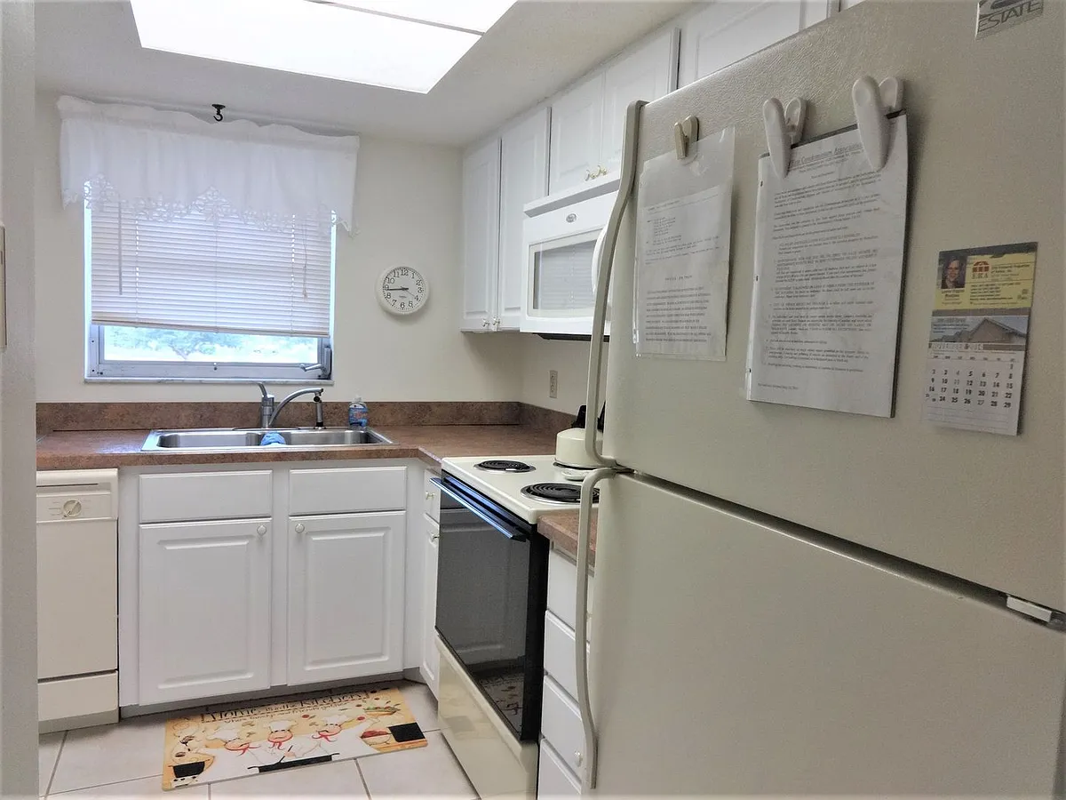 Building Photo - 102 Capri Isles Blvd #210
