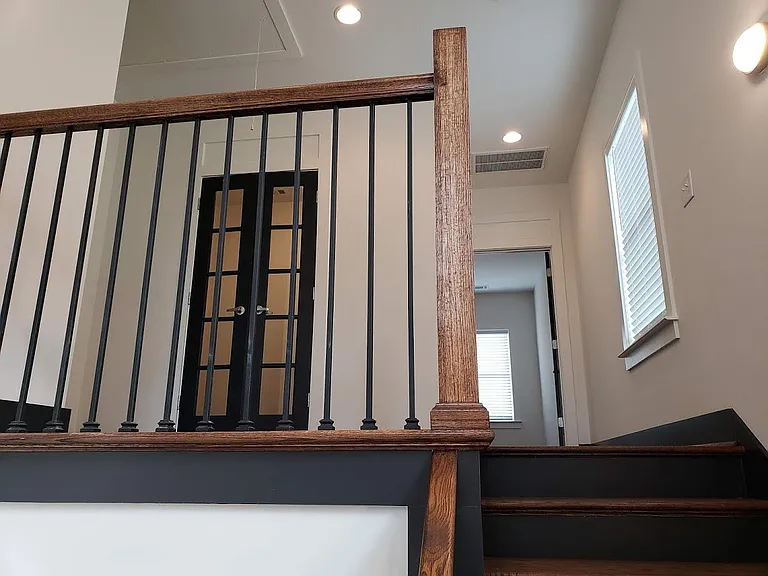 View of upstairs landing & French doors to office.
