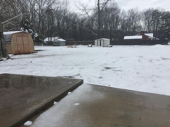 1/2 acre lot with 2 large sheds for storage and projects.