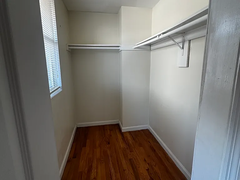 Walk in closet in back bedroom