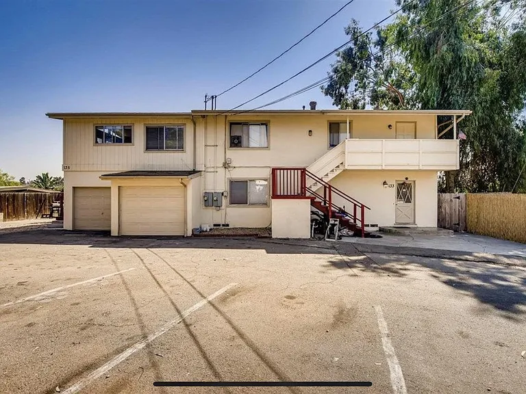 Exterior of home, parking for 1 vehicle here