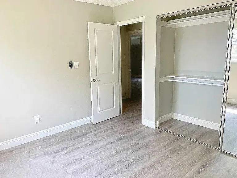 Bedroom w/updated fixtures and lighting