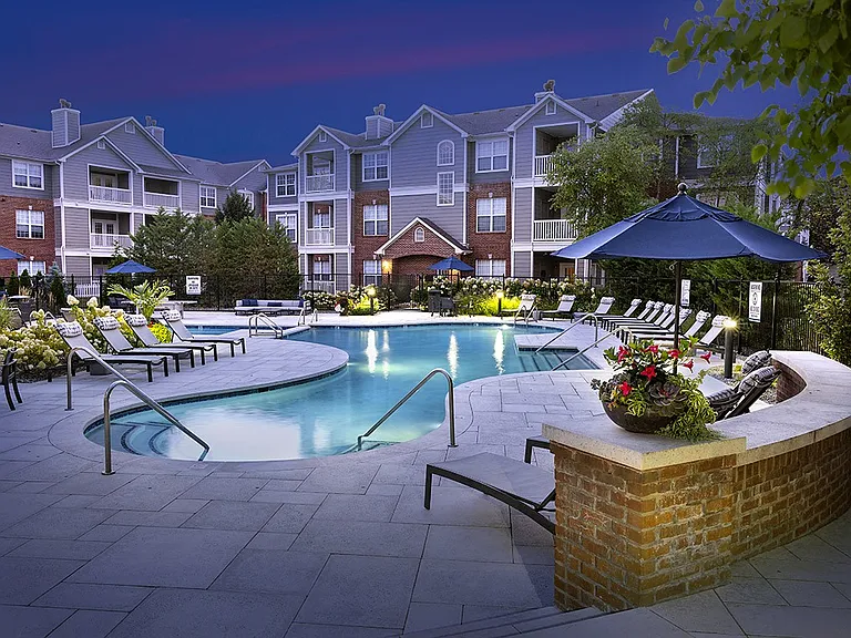 Resort-style pool at dusk