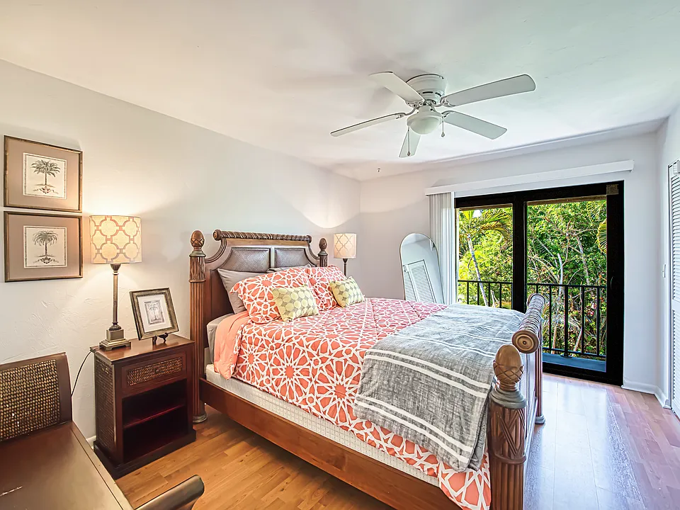 Primary Bedroom w/balcony & exterior storage. LTV Flooring