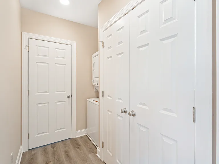 Hallway leads to bedroom to keeps any noise out.
