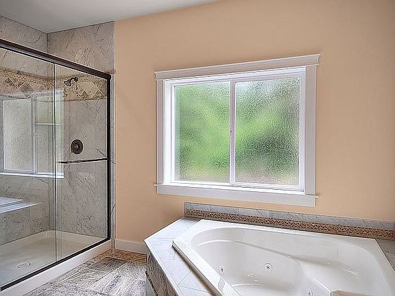 Italian Marble, double headed shower, jetted tub, seperate water closet, 
