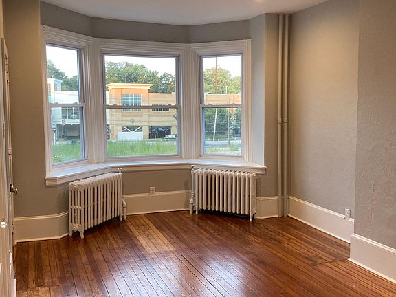 Living room with big windows that allow in ample natural light