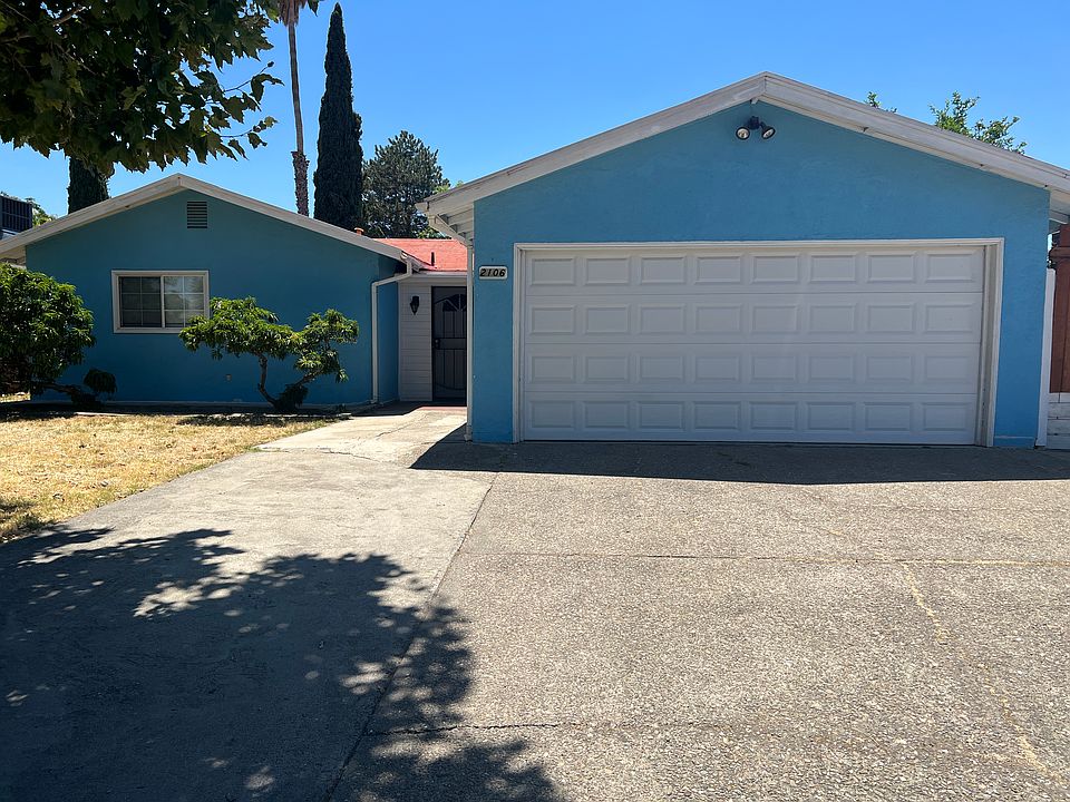 Front of home- unit enters from left of home / opposite of garage