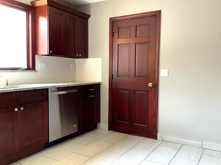 Kitchen plus back door access to washer and dryer