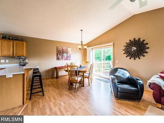 Separate dining space from the kitchen.  Breakfast bar is a great addition.