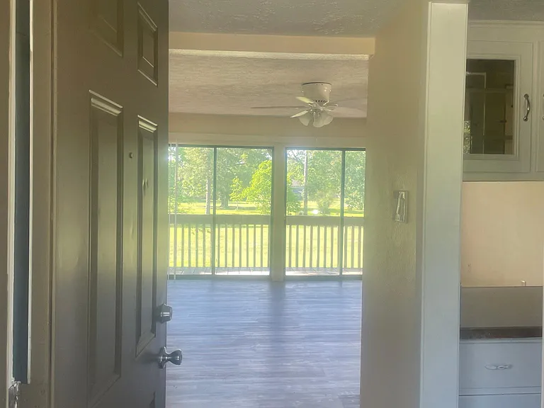 Entry to living room w views- kitchen to right
