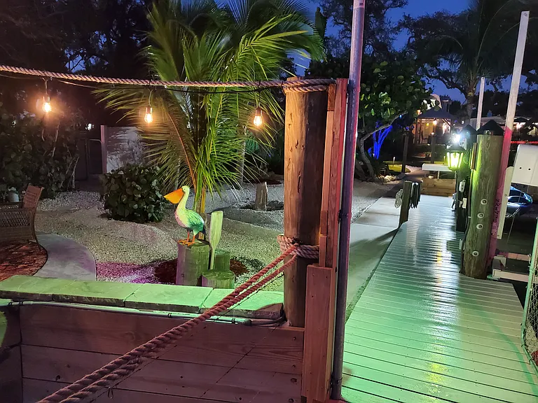 NIGHTIME AT BAYSIDE BAR AND DOCK