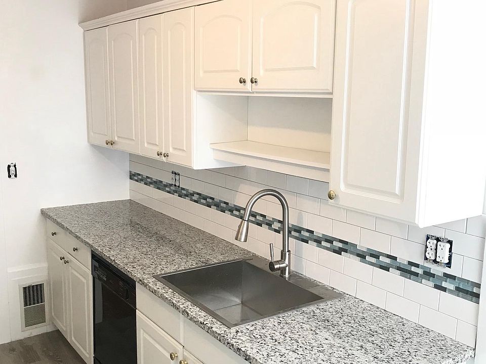 New backsplash, granite counter tops and sink!