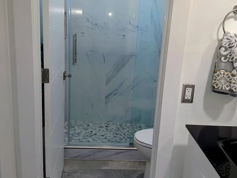 Step in glass door shower