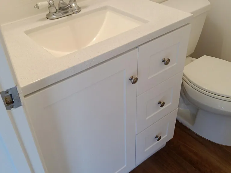 Half bath between kitchen and living room.