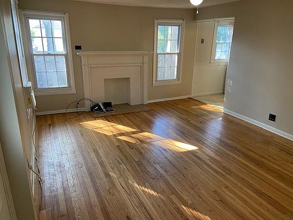 Living Room (decorative, non-functioning fireplace)