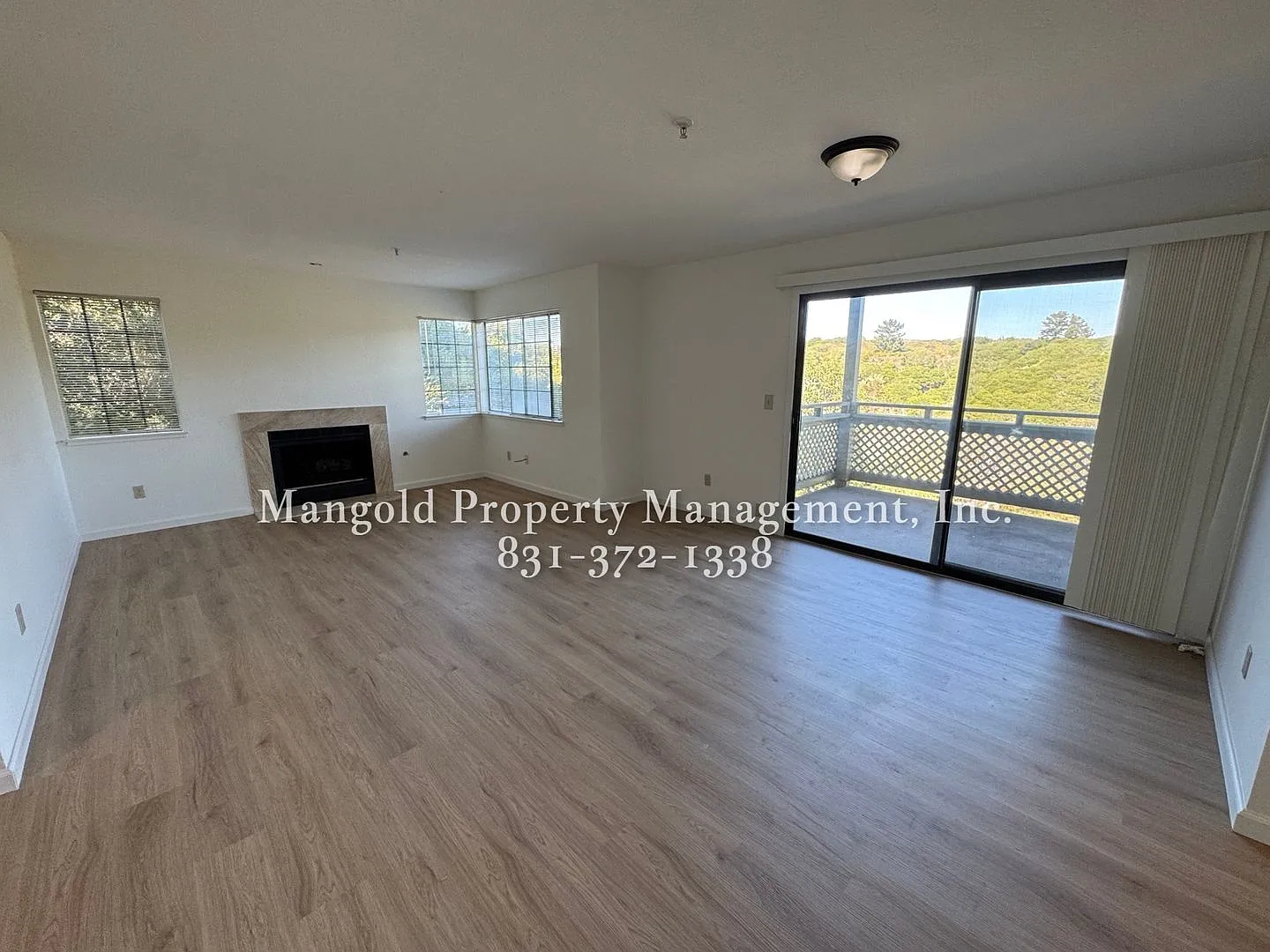 Spacious 2-Bed, 2-Bath Condo with Fireplace & Private Balcony — Photo 3
