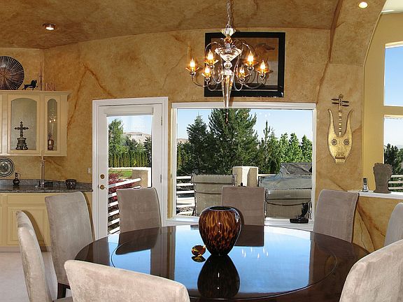 Formal dining area leads to deck