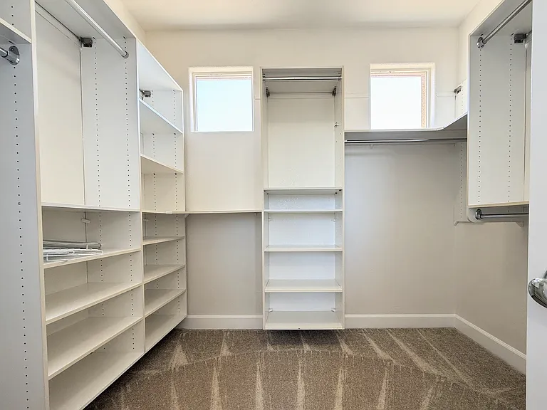 Primary Bedroom Walk-in Closet
