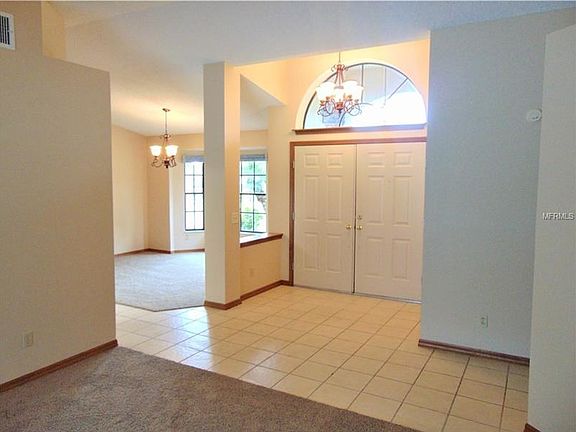 Entry way and formal dining from formal living