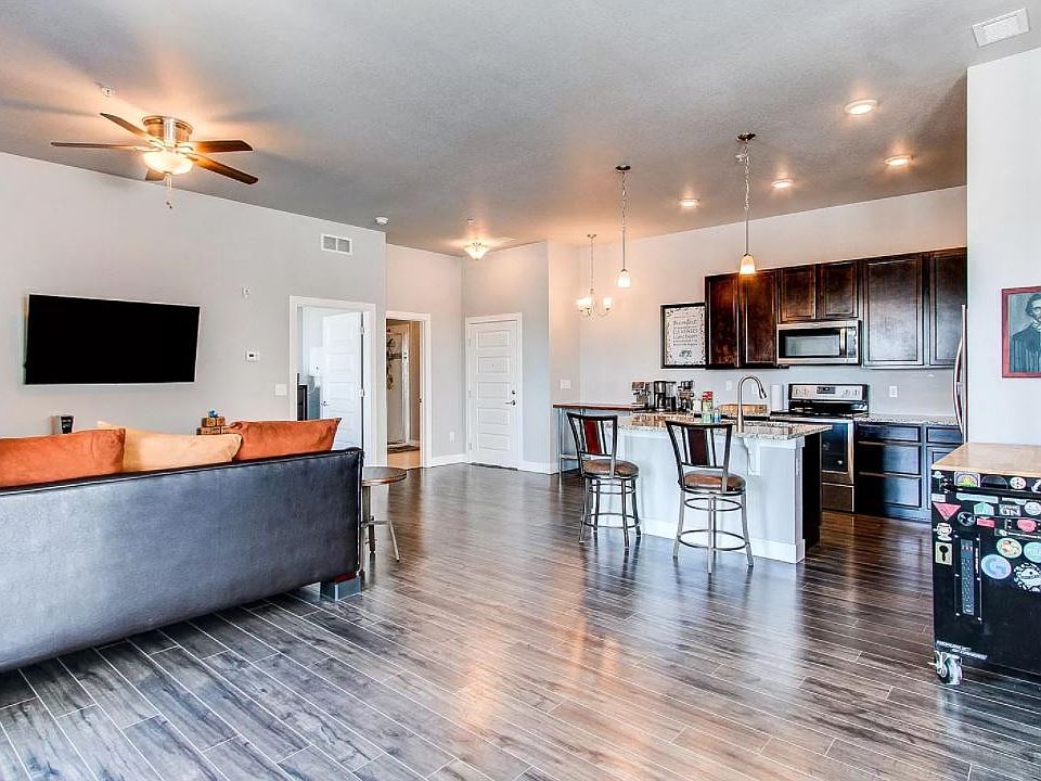 Looking from exterior entrance to living room and kitchen