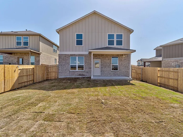 Large backyard with covered patio! Just a few blocks from the lazy river pool/amenity center!