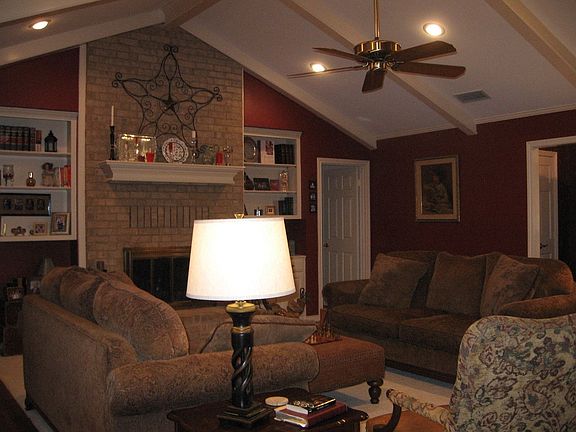 LR with wood floors, WBFP, built-ins