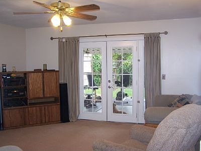 French doors lead to backyard.