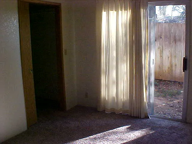 BEDROOM DOOR FOR ACCESS TO NON PRIVATE PATIO AREA